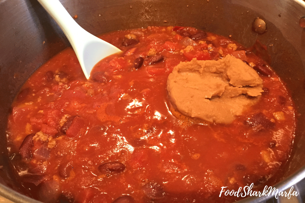 Add-the-refried-beans-to-the-pan Add-the-refried-beans-to-the-pan