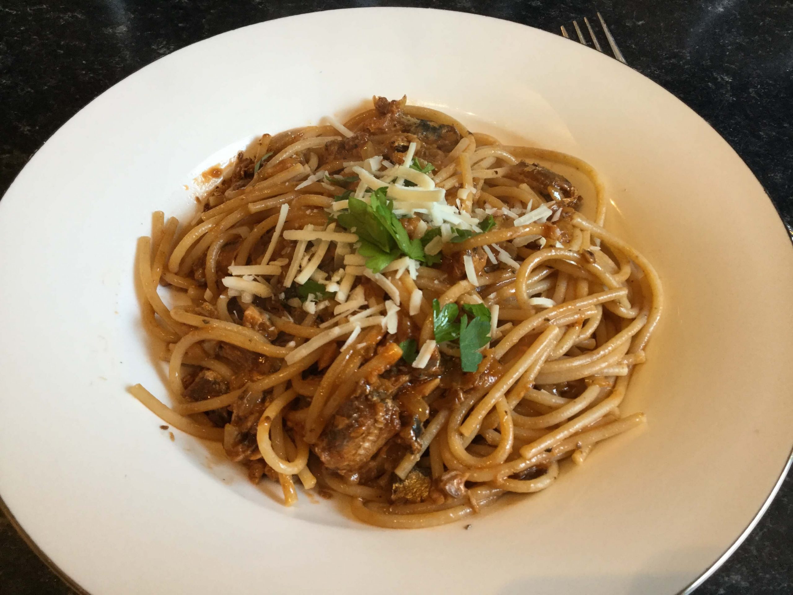 Plate up and garnish with a little fresh parsley and a sprinkling of parmesan